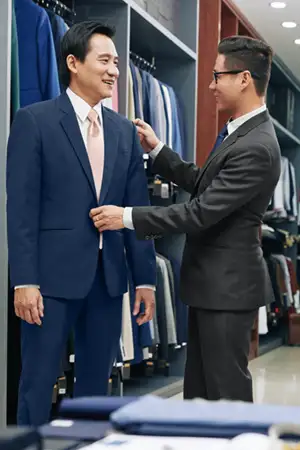 Guy visiting a store to get measured